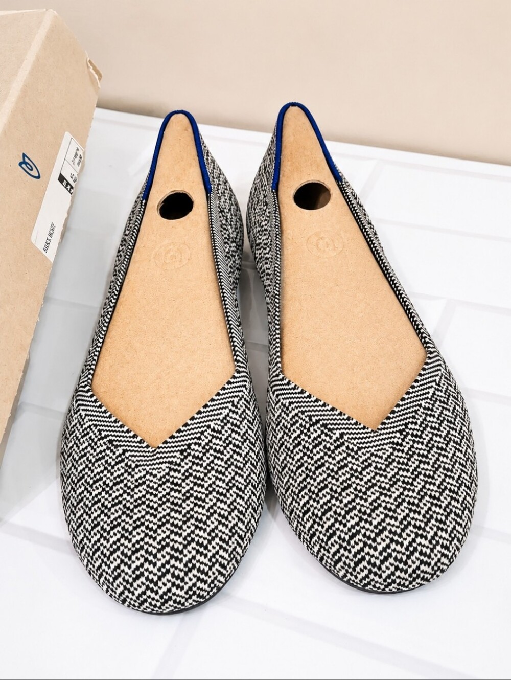 Rothy's Black and White Herringbone Slip-On Flats